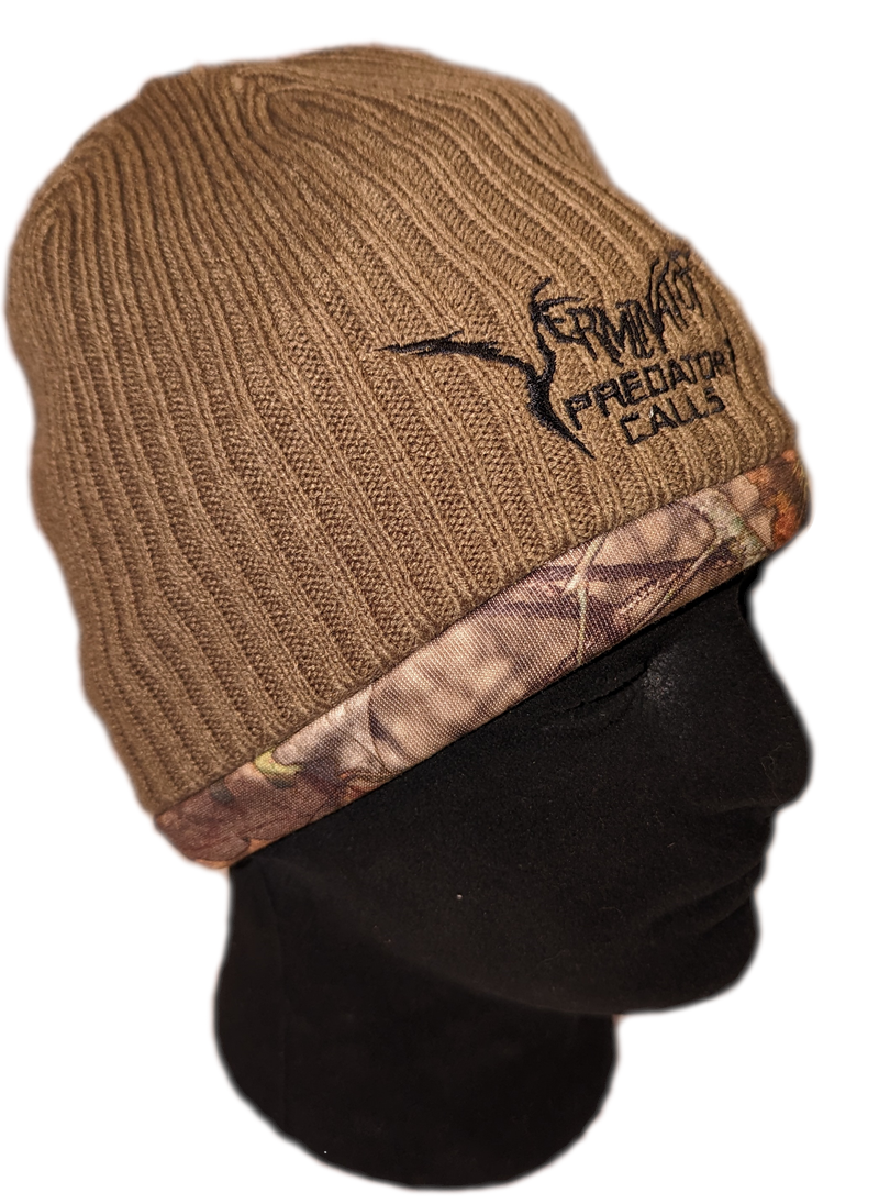 Verminator Brown knit beanie with camouflage band and logo on a mannequin head against a white background